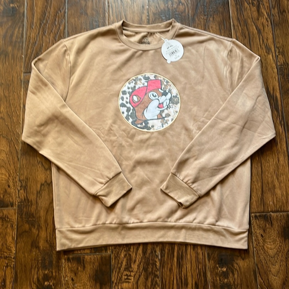 Bucees light brown girls sweatshirt, size large
